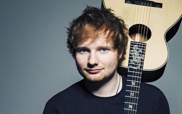 Ed Sheeran with a guitar. Credit:FLICKR/ARRECITAL