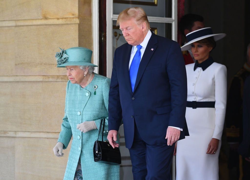 Queen Elizabeth II, U.S President Donald Trump and First Lady Melania Trump, during the Ceremonial Welcome at Buckingham Palace on the first day of the U.S. president and First Lady's three-day State visit on June 3, 2019 in London, England. (Photo by Victoria Jones - WPA Pool/Getty Images)