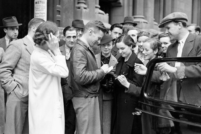 Douglas Corrigan signing autographs in Dublin on July 20, 1938 (Getty Images)