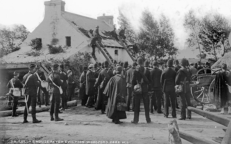 Constables surround the home of boatbuilder Francis Tully on land owned by the Marquis of Clanricarde at Woodford, County Galway. IMAGE: NATIONAL LIBRARY OF IRELAND