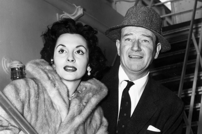 Pilar Palette and John Wayne in 1956 (Getty Images)