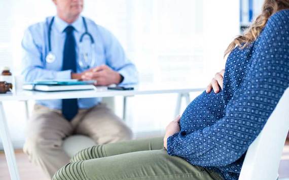 Pregnant woman with doctor. Credit: iStock