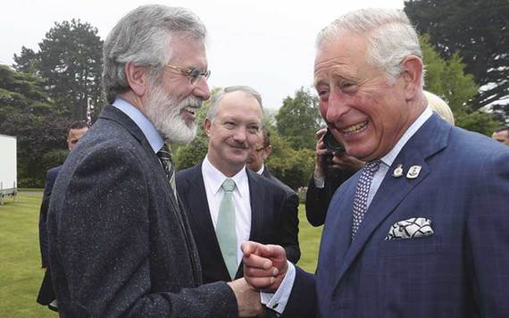Prince Charles laughs with Gerry Adams during a visit to Glencairn House in Dublin earlier this year. Credit: Damien Eagers/Rollingnews.ie