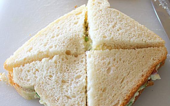 How do you cut your egg salad sandwiches.