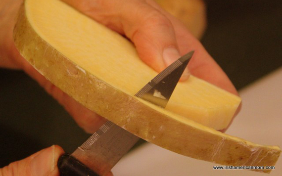 Peeling the sliced rutabaga.