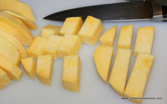 Dicing the rutabaga flesh.