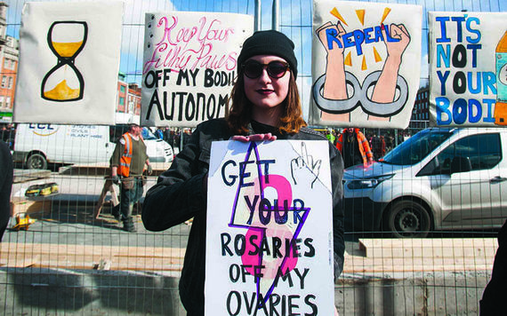 A rallying cry from the pro-choice camp: "Get your rosaries off my ovaries".