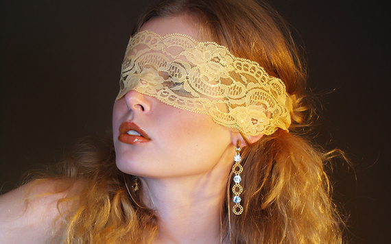 Close your eyes and put out your hands... blindfold games on Halloween comes from the Irish.