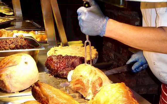Carve that freshly roasted meat! Delicious.