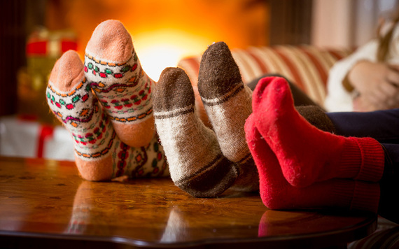 The family snuggled up for Christmas. What more could any parent want?