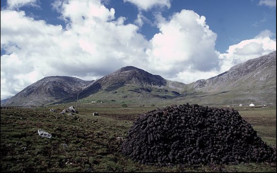 Turf piled high in Connemara, County Galway.