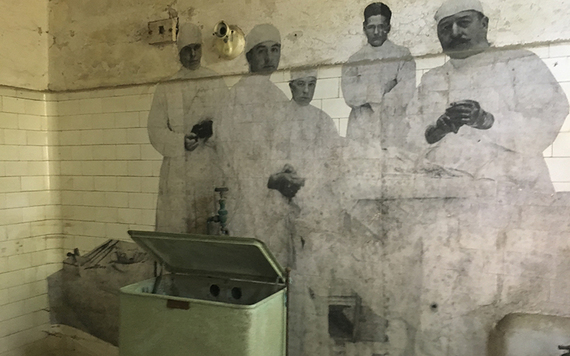 A JR installation of real doctors and surgeons on Ellis Island. Photo: Sheila Langan