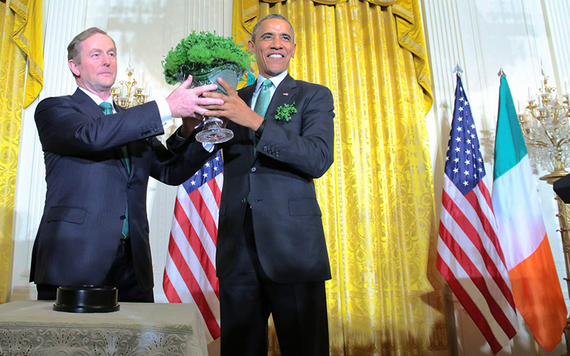 Enda Kenny presenting the traditional bowl of shamrock to Barack Obama on Saint Patrick's Day.