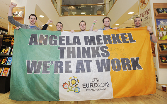Great job supporting our soccer team lads but it's a no to writing on our national flag.