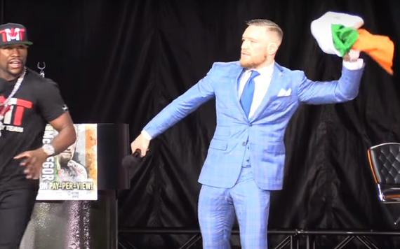 Mayweather and McGregor putting on a show at one of their four-press conferences.