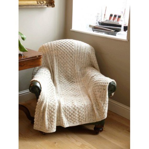 Keep the cold at bay with this Honeycomb Wool Throw by Carraig Donn