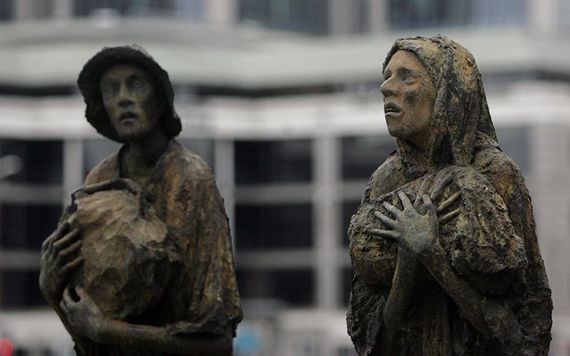 The moving statues dedicated to the Famine immigrants along the quays of the Liffey.