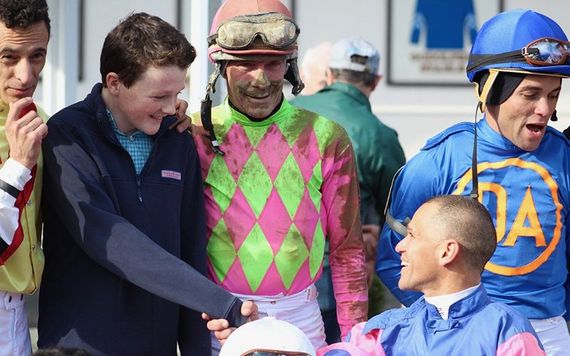 Liam O’Brien with the jockeys at Aqueduct Racetrack on Saturday.