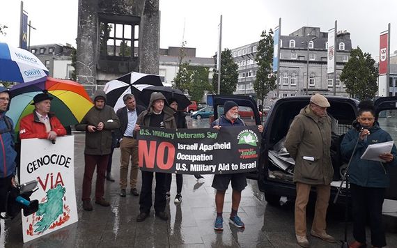 Protesters listen to US army vets in Arye Sq in Galway.