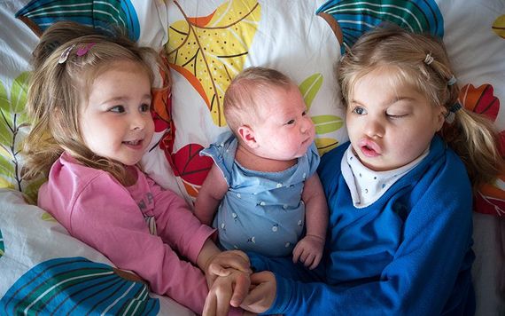 Sisters Nadia Nowicki, three, baby Ida & Alicja, 10.