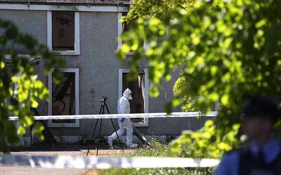 Forsensic teams examine the site where Ana Kriegel's body was abandoned.