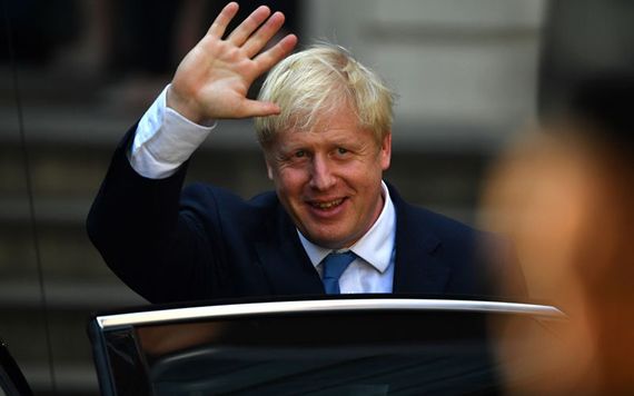 Boris Johnson greets the crowds having accepted the position of leader of the Tory party.