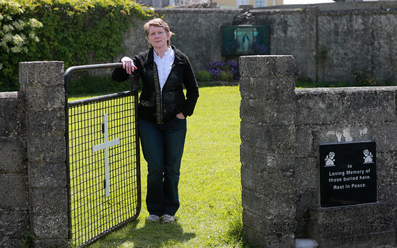 Catherine Corless standing infront of the plot where 796 babies were buried in a mass grave.