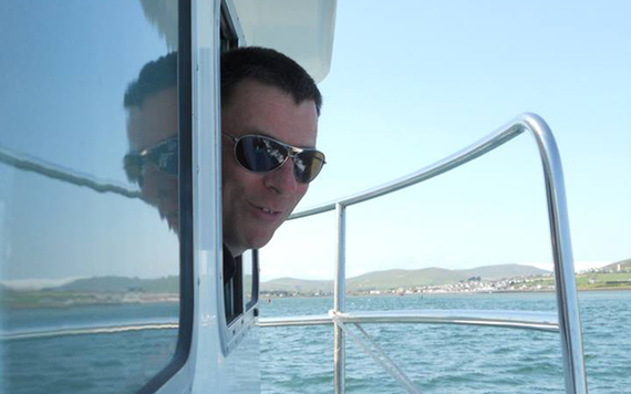 The captain of the boat poked his head out the window and called Fungie...he came!