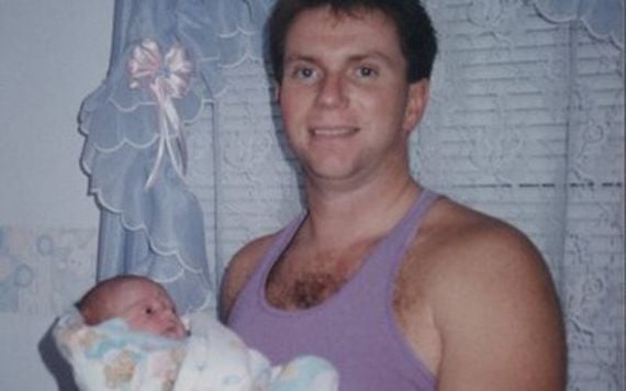 Joe holding his daughter, Kelly.
