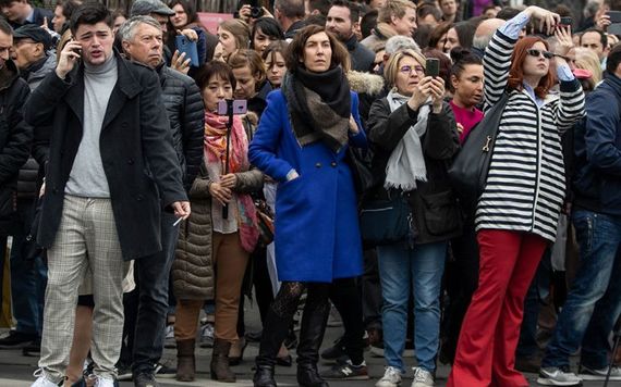 The public looking on as Notre Dame burns. Image: Getty.