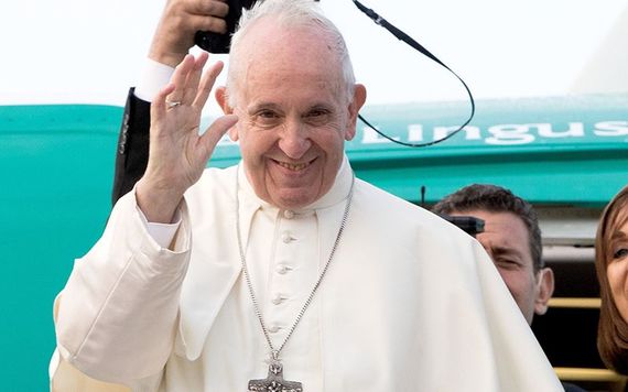 Pope Francis waving goodbye at Dublin Airport.