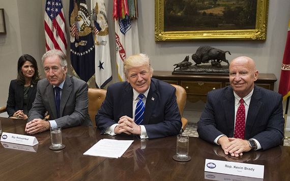 Richie Neal sitting alongside President Donald Trump. Image: Kevin Brady/Getty.