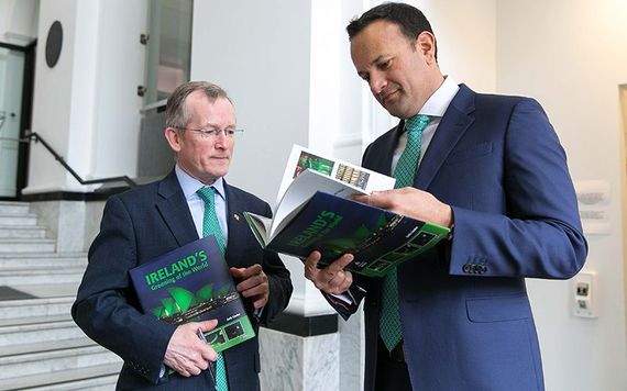 Gibbons and Varadkar admiring the newly launched "Ireland’s Greening of the World" book.