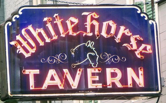 The neon sign outside the White Horse tavern.