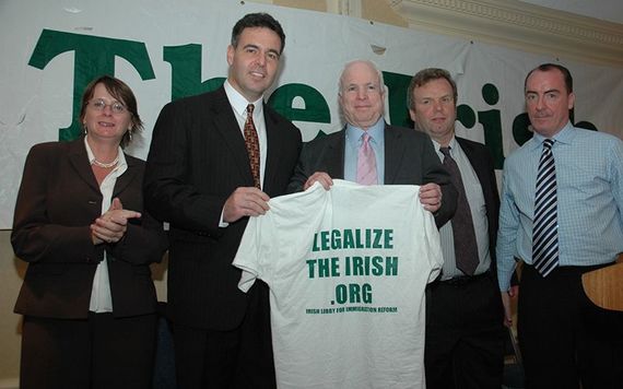 Standing with the Chairs of ILIR, Senator John McCain.