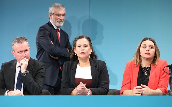 Gerry Adams, walking behind Sinn Fein's Conor Murray and Mary Lou McDonald at the 2017 Ard Fheis.