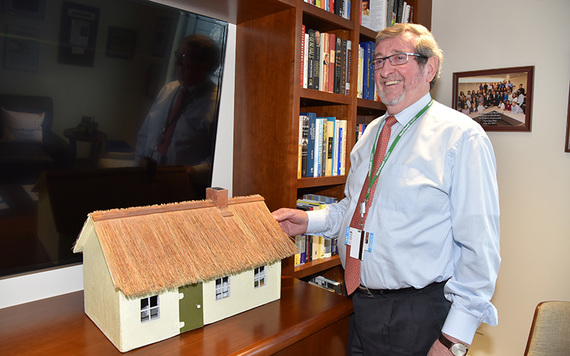 Michael Dowling with the replica of his childhood home that he constructed.  (Photo:Nuala Purcell.)