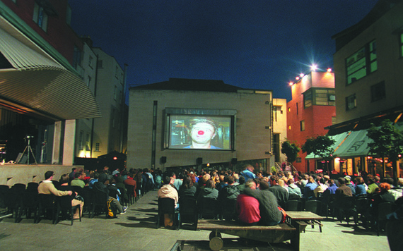 Watching a movie on a summer's night at Meeting House Sq in the middle of Temple Bar.