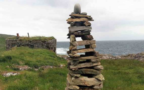 One of the many tall cairns Dan Hummel erected in front of his house. Image: Brian Keane.