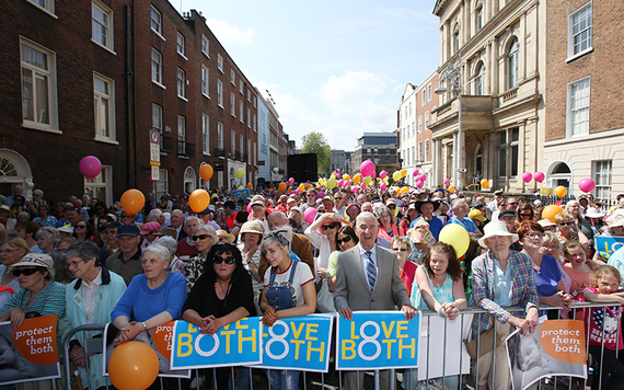 A pro-life rally with "love both" posters.