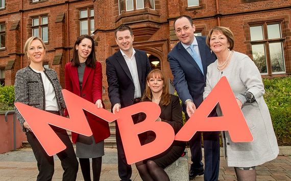 Staff at Queens University Belfast celebrate the launch of the MBA.