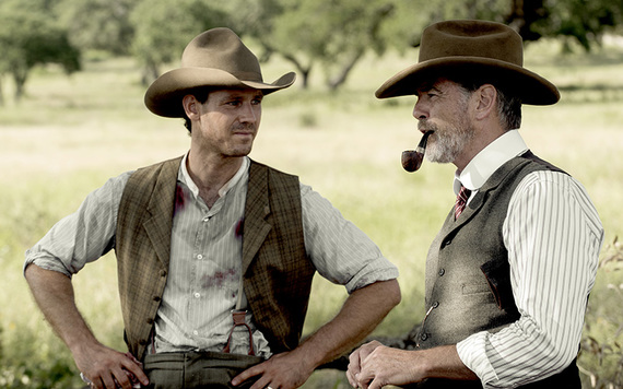 Henry Garrett as Pete and Pierce Brosnan as Eli in The Son.