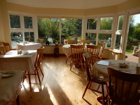 Tricia Gammell’s magnificent sunlit dining room at 2 Mile Lodge near Kenmare.
