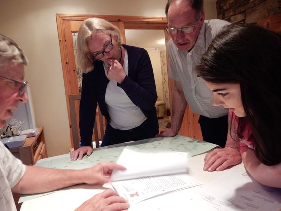 Mike shares genealogy records with Denise, Jim and Deidre Fitzpatrick in the Glenraha Farmhouse dining room. An exciting night spent “chasing” Fitzpatrick ancestors.