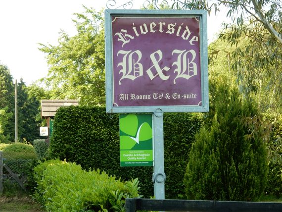 Deidre and John Lynham’s roadside sign welcomes guests to Riverside B&B in Laragh, Co. Wicklow near the historic Glendalough Monastic Site.