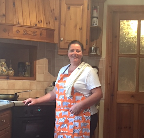 Tricia Gammell prepares breakfast in her kitchen at the 2 Mile Lodge B&B just west of Kenmare at the base of the Ring of Kerry.