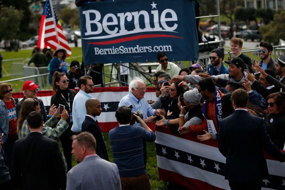 2020 Democratic presidential candidate U.S. Sen. Bernie Sanders (I-VT), center, greets supporters after a campaign rally at Great Meadow Park in Fort Mason on March 24, 2019 in San Francisco, California. (Photo by Stephen Lam/Getty Images)