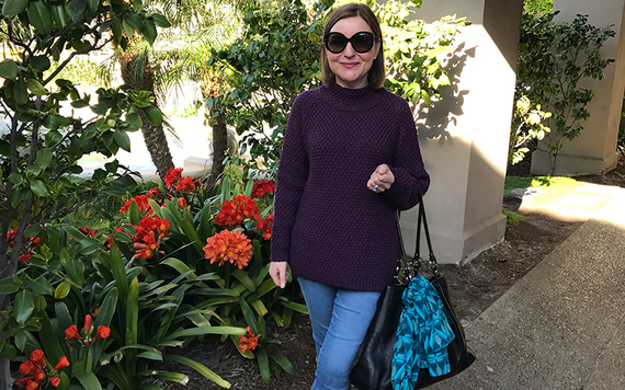 Sweater: Blarney Woollen Mills, jeans: Rant and Rave, scarf: Dúinn Designs, bag: Holden Leather Goods. Photo: Alison Carreon.