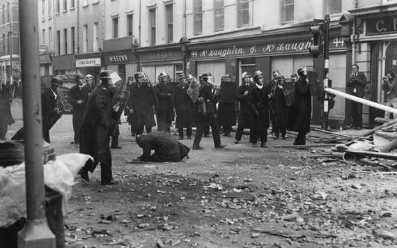 1969: Riot police on the streets of Derry City during a civil rights demonstration in the Bogside. (Photo by Stan Meagher/Express/Getty Images)