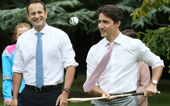 Trudeau trying out his new sliothar and hurl.